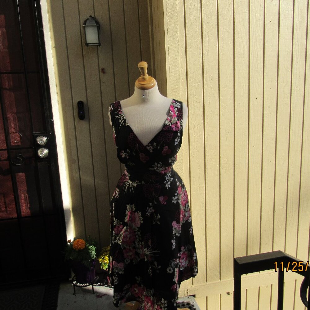 #608  NEW WOMAN''S BLACK FLORAL DRESS BY COLLECTION  (SIZE 16US / 20UK)